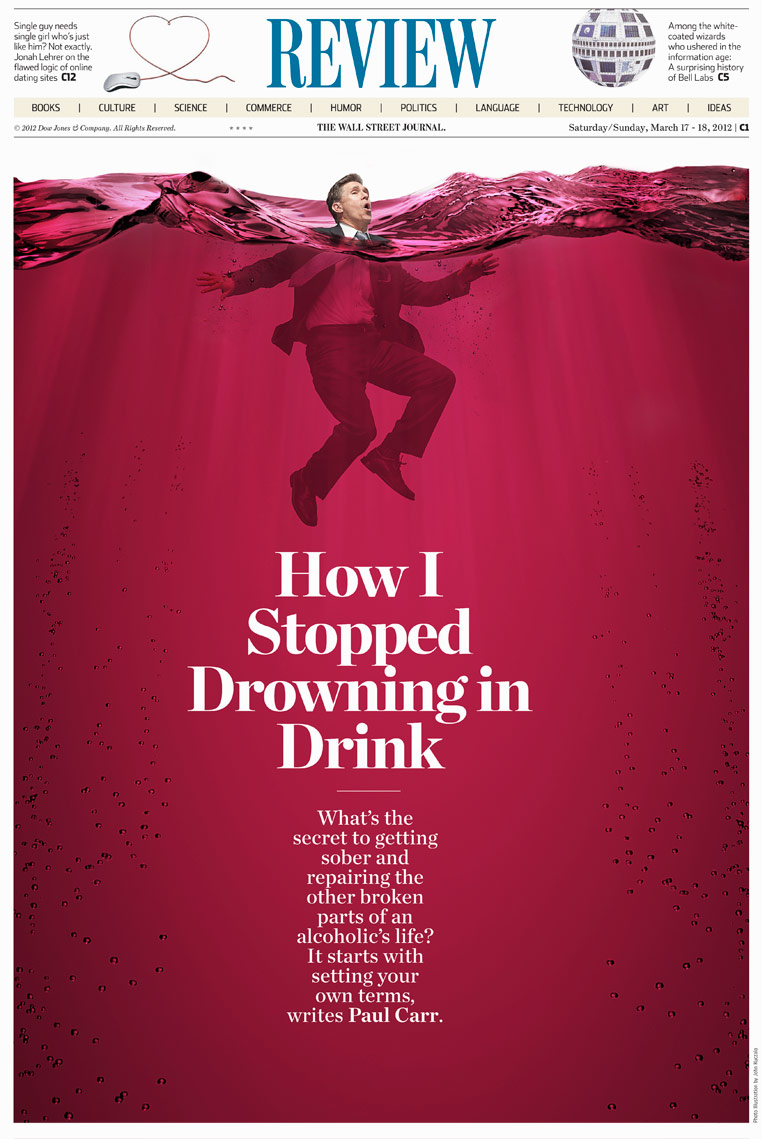 Alcoholic drowning in drink conceptual photo by John Kuczala
