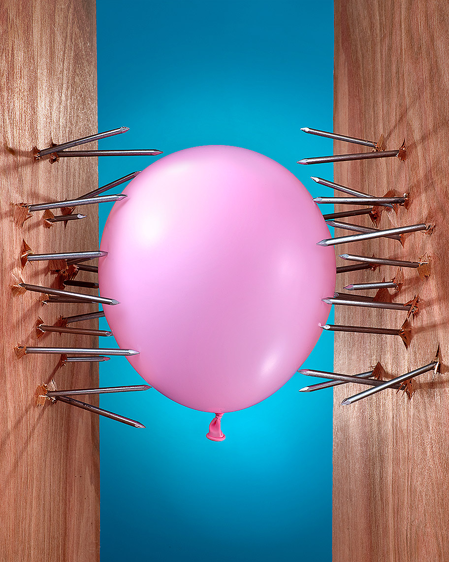 Balloon in nails stress photo-Illustration by John Kuczala