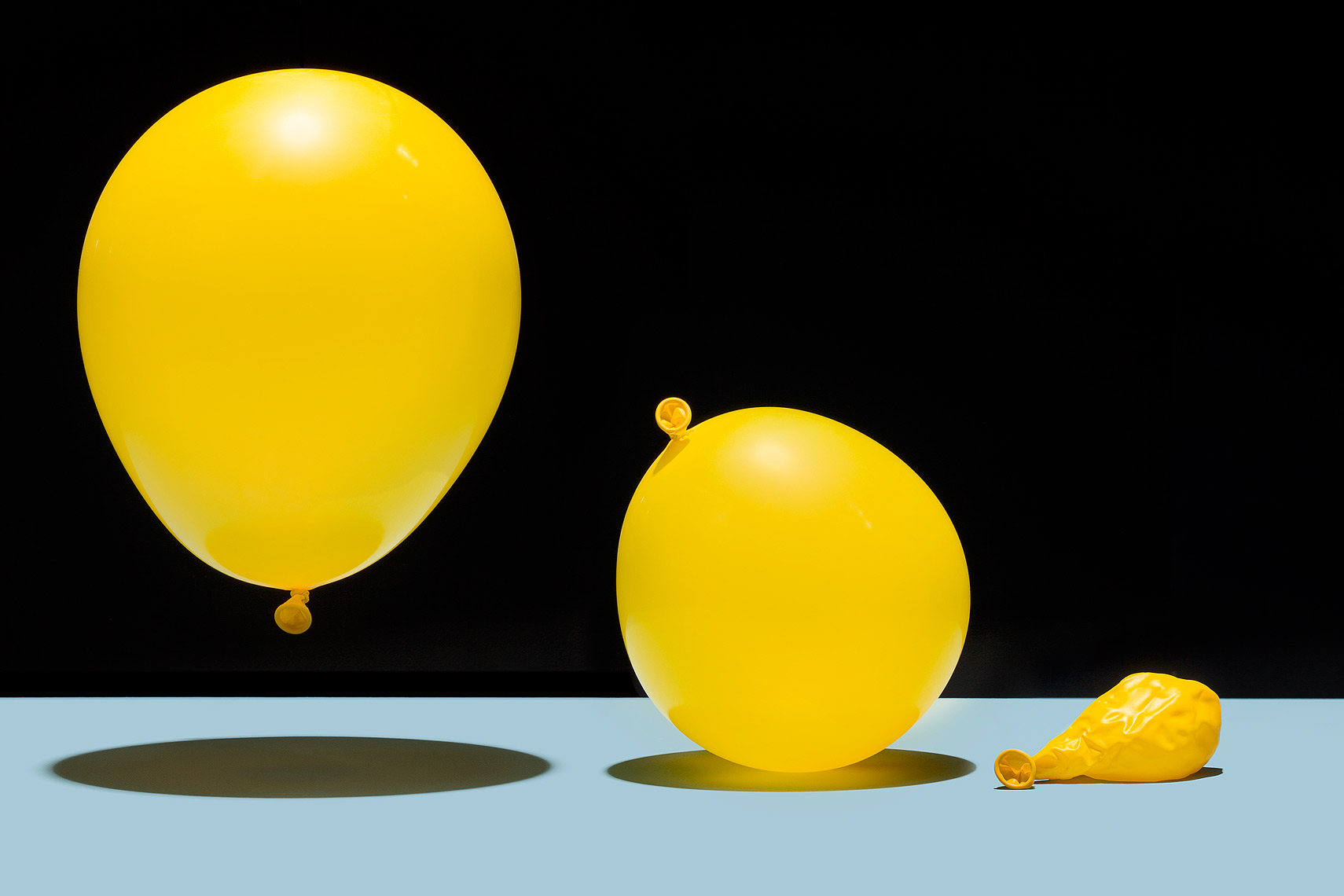 Balloons deflating photo by John Kuczala