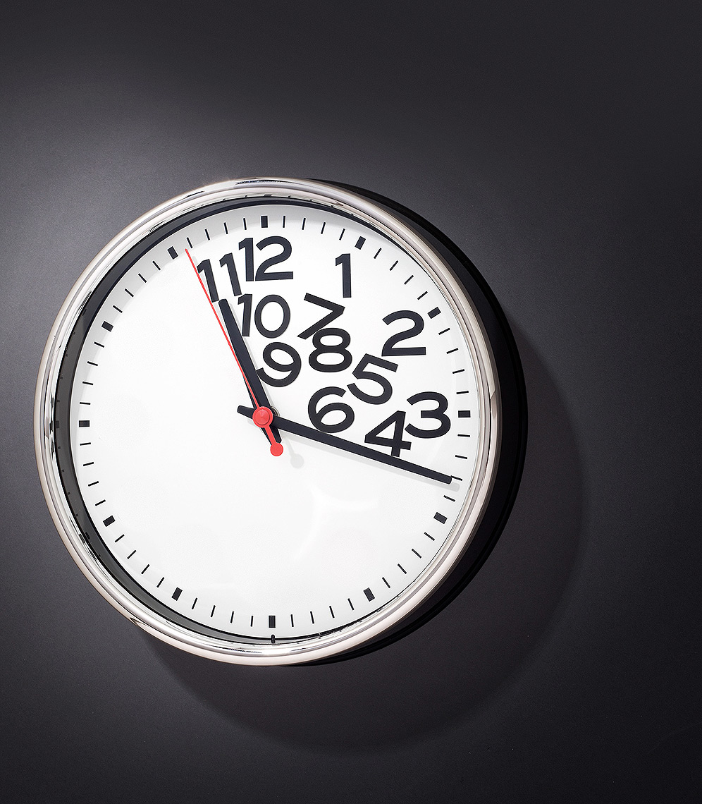 Time crunch on clock photo-Illustration by John Kuczala