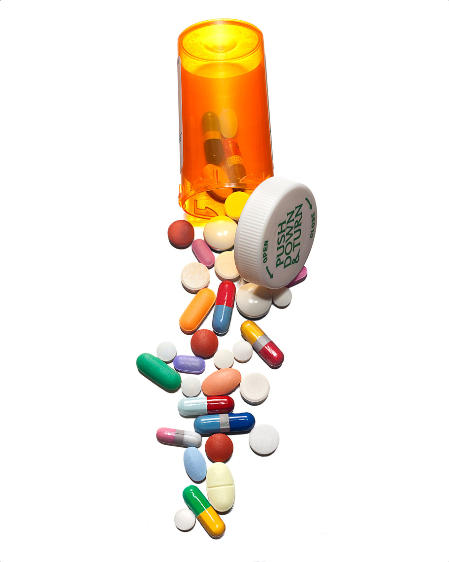 Prescription pills spilled pharma photo by John Kuczala