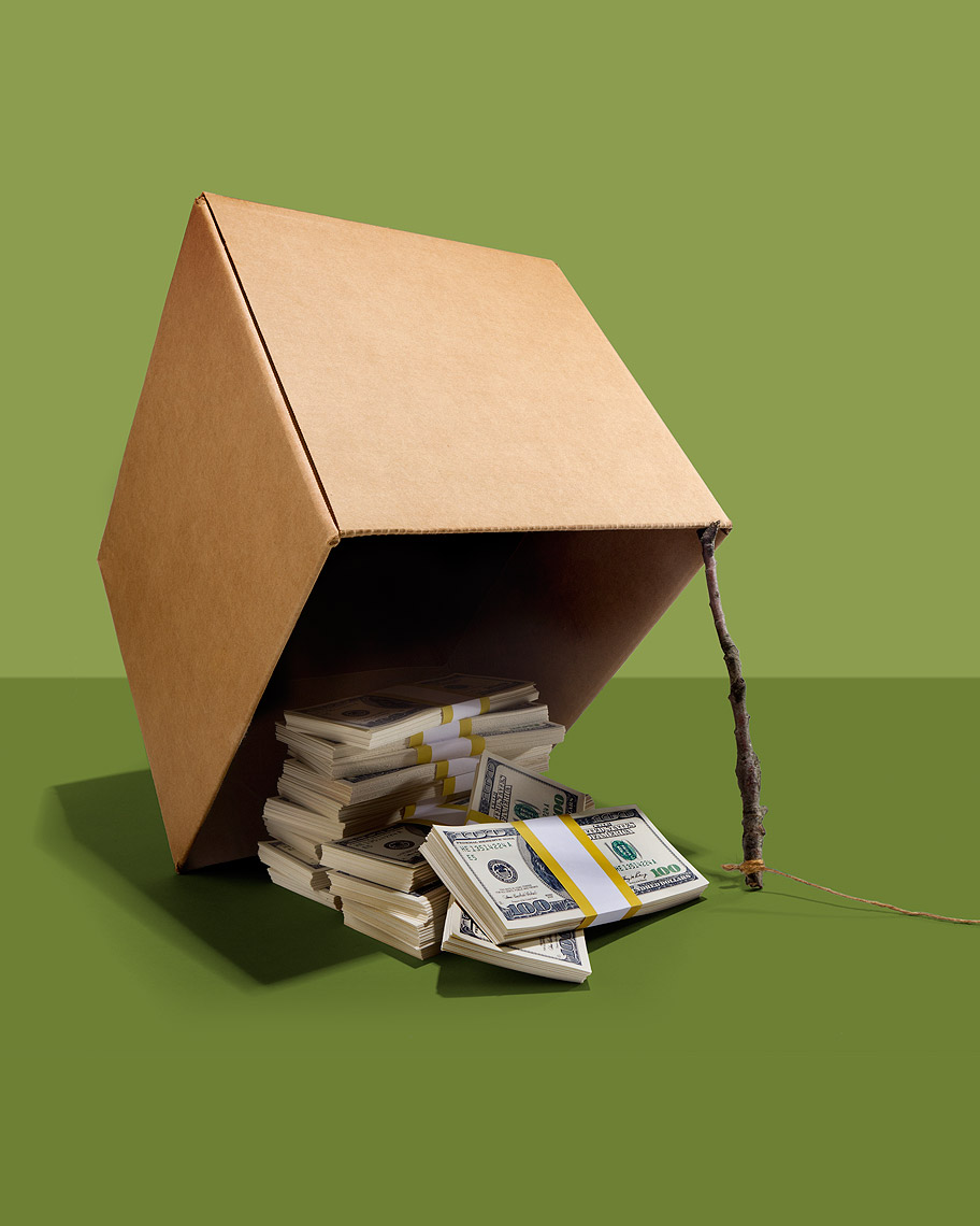 Cardboard box money trap, with cash bait photo by John Kuczala